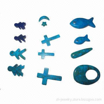 Compressed turquoise beads and cabs in carved animal/cross shapes, various styles are available